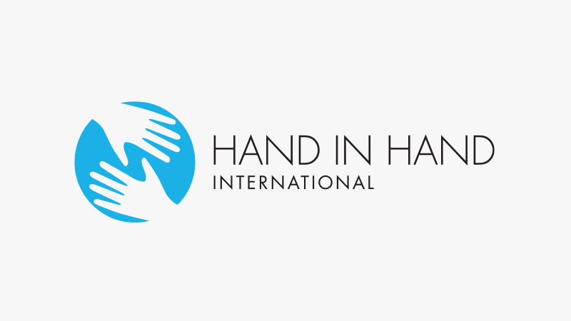 Hand in Hand International logo.